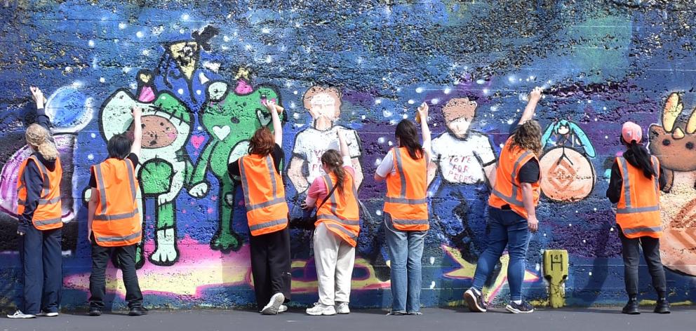 South Dunedin Street Art Trail’s young workshop participants finish their mural in Wilkie Rd...