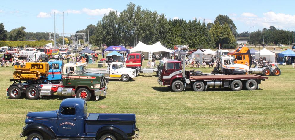 Vintage trucks parade around the Edendale Recreation Grounds during the Edendale Crank Up at the...