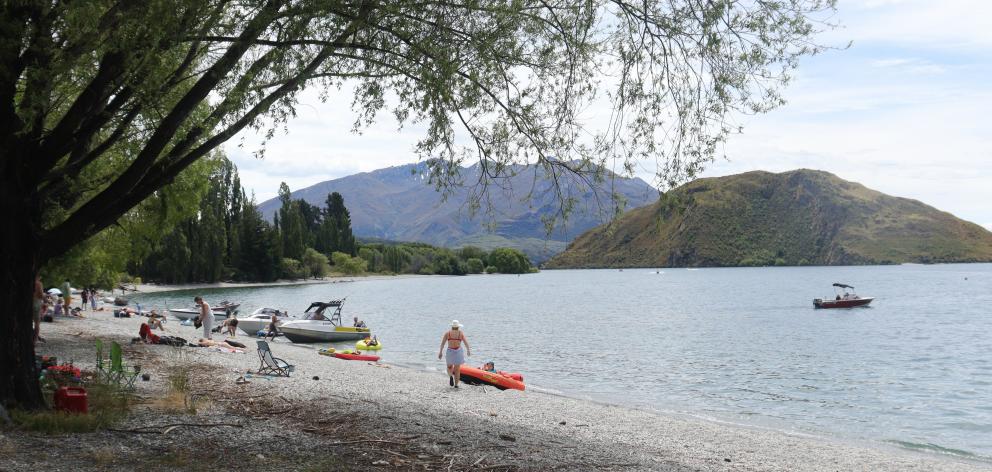 Holidaymakers enjoy Glendhu Bay in the leadup to the New Year. PHOTOS: RAWAN SAADI