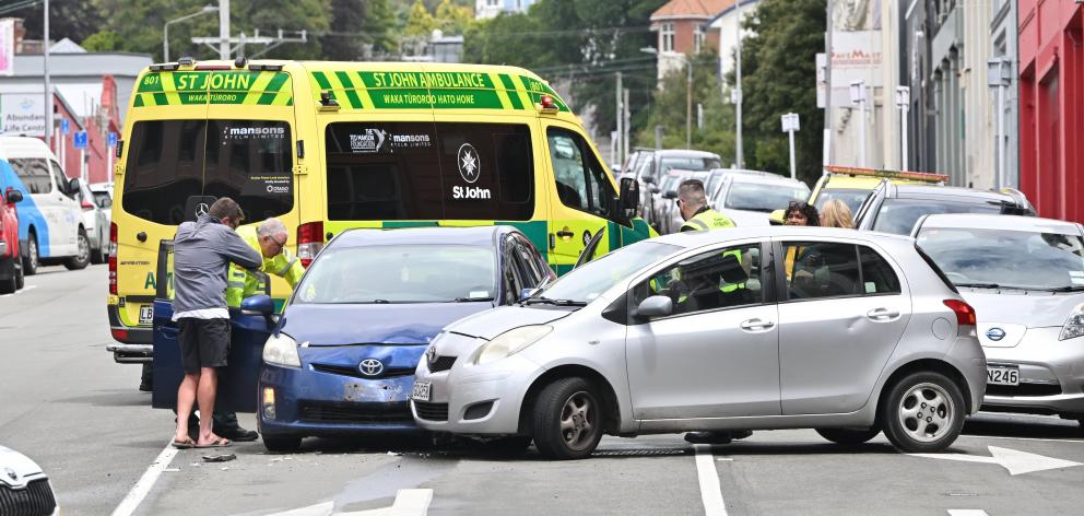 Emergency services at the scene of a crash in Stafford St this afternoon. Photo: Gerard O'Brien