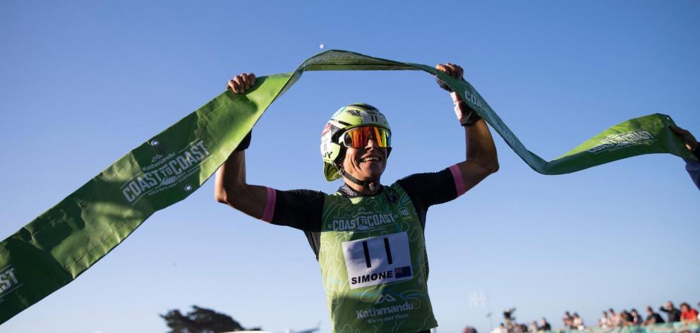 Simone Maier, of Wānaka, celebrates her fifth Longest Day win at the Coast to Coast last February...