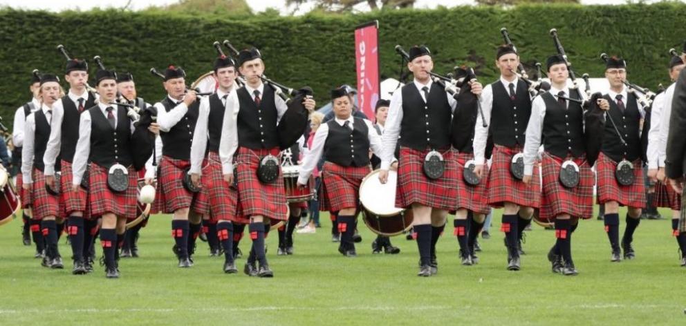 Canterbury Caledonian Society’s Pipe Band includes three Ashburtonians, Harrison Doak, (back left...