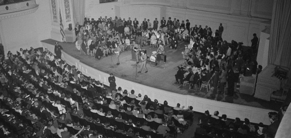 The Beatles performing at Carnegie Hall in 1964. Photo: Getty Images