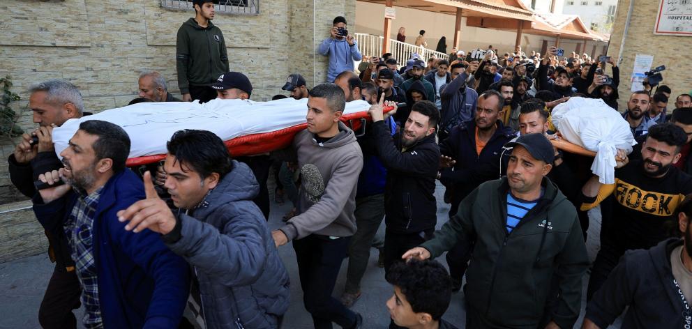 Mourners at a funeral procession in Gaza City. PHOTO: REUTERS
