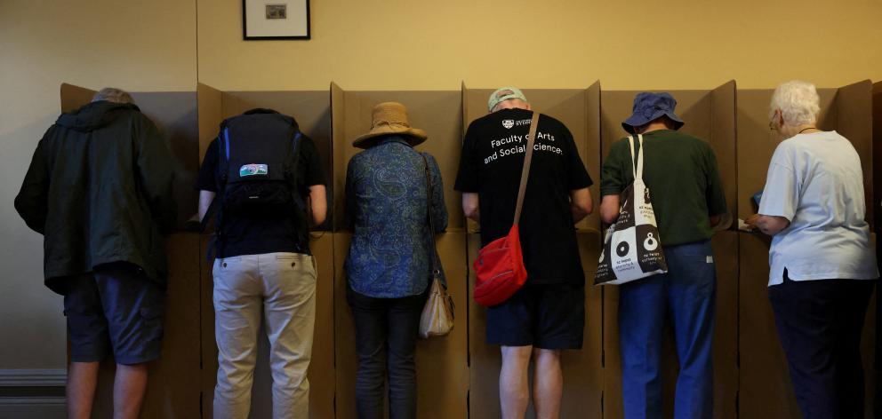 People vote at a pre-polling centre in Sydney. PHOTO: REUTERS