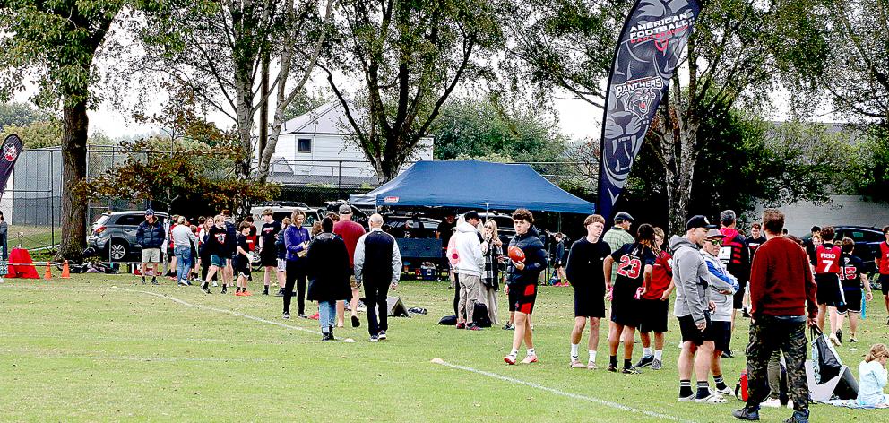 Flag football draws plenty of spectators to the sidelines on game day. PHOTO: MATIAS GLIDDEN