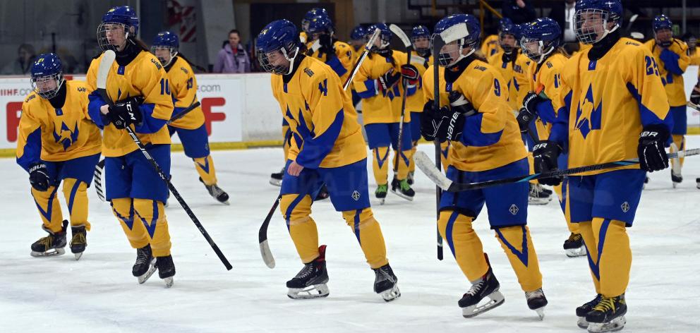 Ukraine leave the ice during their 5-1 win over Turkey in the division 2, group B world...