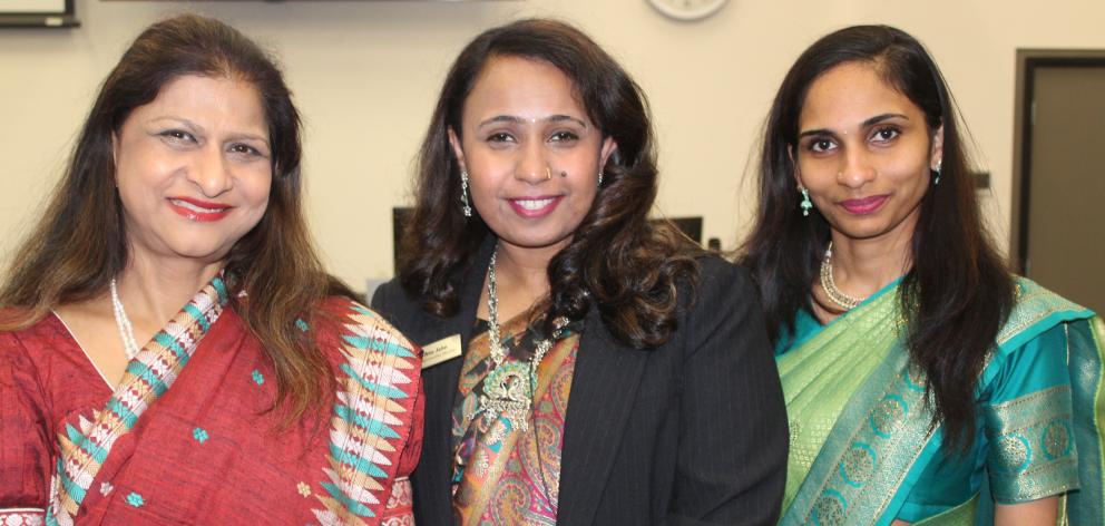 Indian High Commissioner Neeta Bhushan (left) sparked off the smile train with Anu John and...