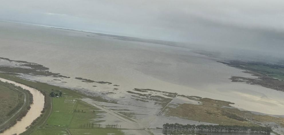 An image taken by Mayor Sam Broughton in a helicopter flyover shows the flooding around Te...
