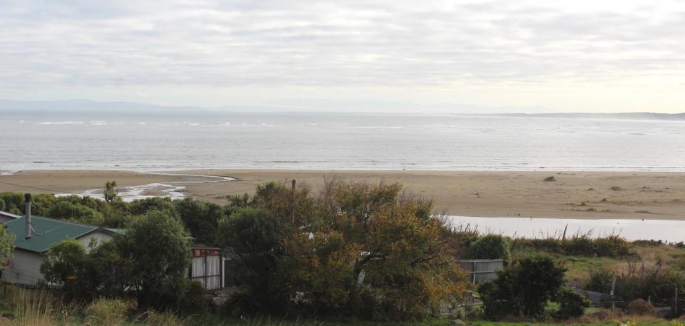 Omaui is a coastal settlement south of Invercargill with views of a beach and estuary. Photo:...