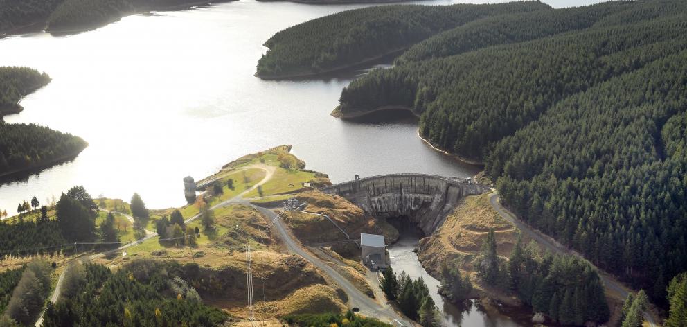 The Waipori Dam at Lake Mahinerangi will be owned by Contact Energy after a merger was approved...