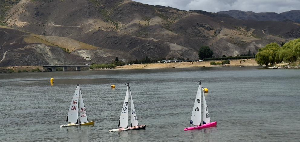 Cromwell Radio Yacht Squadron racing on Lake Dunstan. The boats are 95cm long and controlled by...