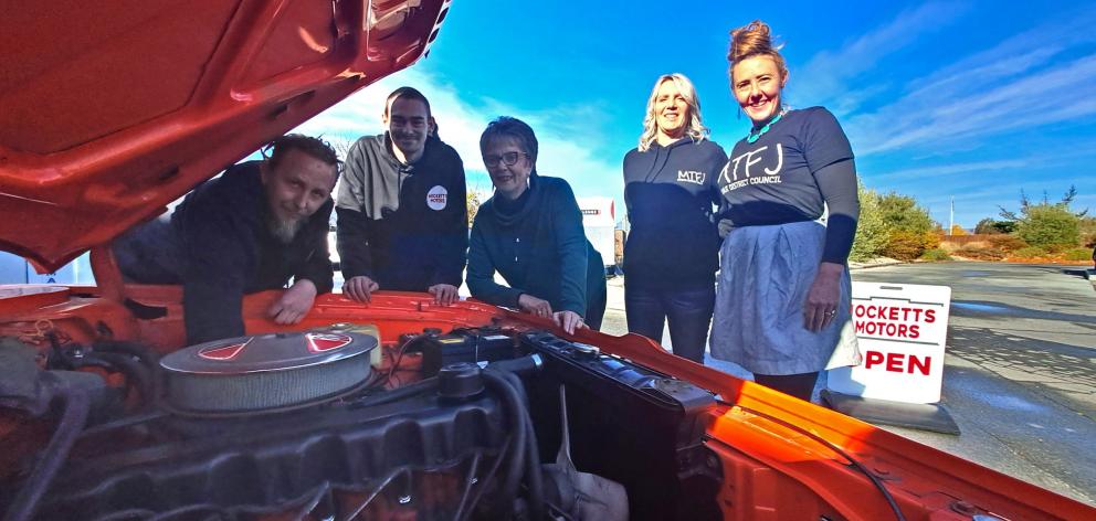 Mocketts Motors owner Chris Gudsell (left), automotive engineering apprentice Marco Shepherd,...