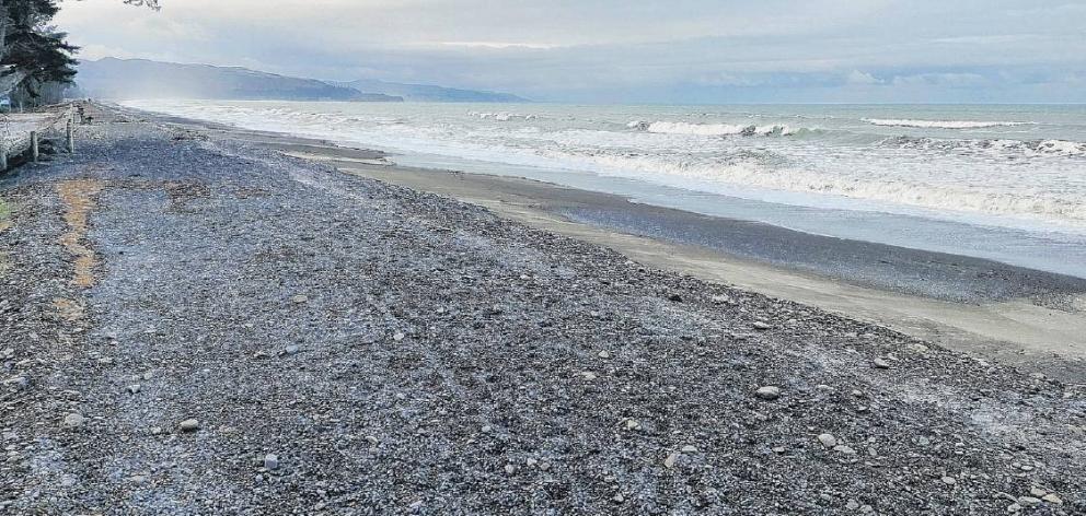 The new bund is providing some protection to Amberley Beach residents for now. PHOTO: DAVID HILL