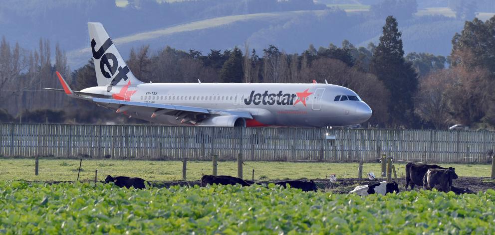 A Jetstar Airbus A320 arriving from Coolangatta, Queensland, on Tuesday turns around on the...