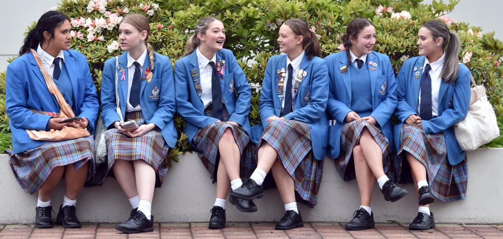 Queen’s High School students (from left) Milah Rata, 16, Angelina Wells, 17, Charlotte Roche, 17,...
