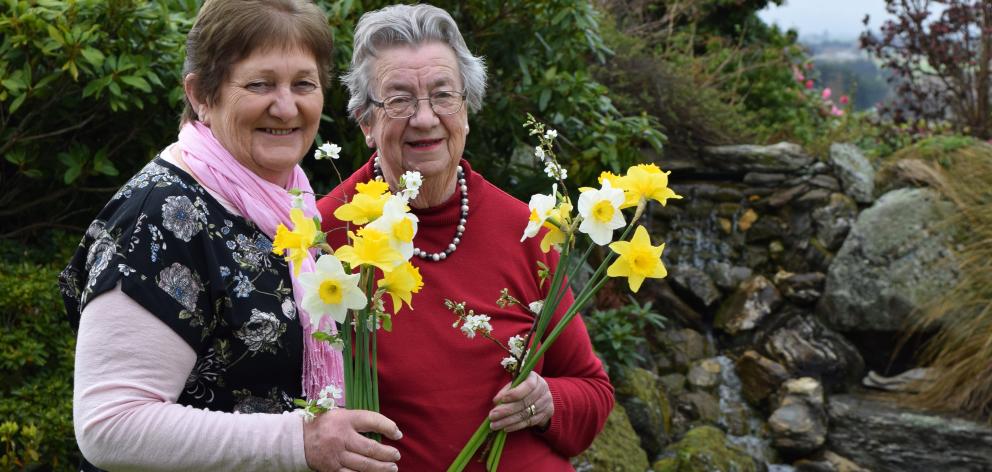 Maungatua Church Flower Show co-ordinator Denise Chaplin (left) and committee member Beth Daniell...