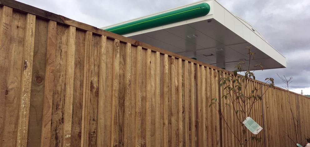 The new fence at the back of Murray Stephen’s house in Irvine St provides a barrier to theBP...