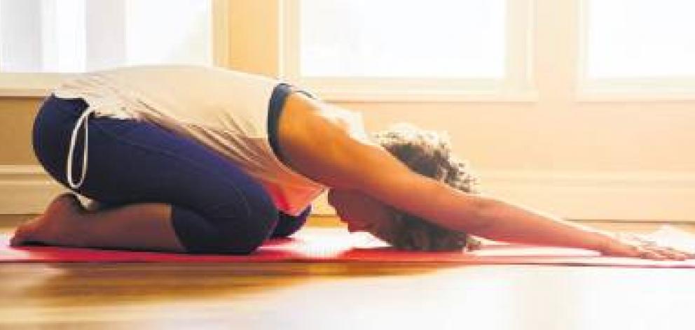 Restorative yoga is particularly beneficial for women with adrenal and thyroid depletion. PHOTO:...