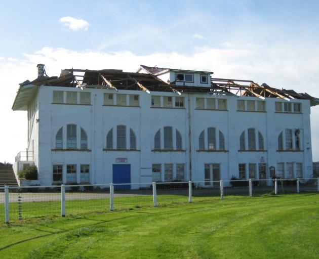 The roof of the Wyndham Racecourse grandstand was badly damaged. Photo: Alan Leitch