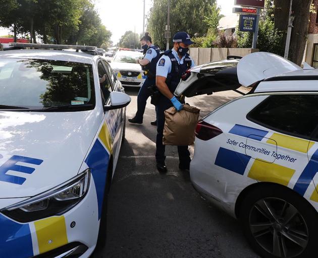 Armed police were seen surrounding the property in Christchurch this morning. Photo: Star Media