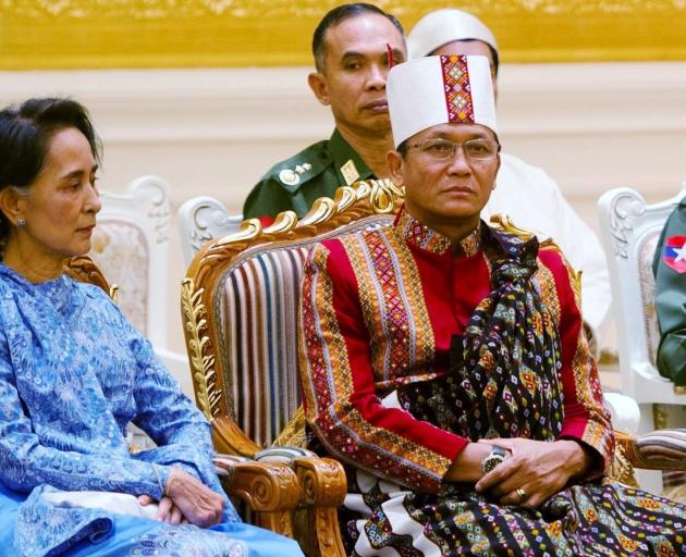 State Counsellor Aung San Suu Kyi (left) with Vice-President Henry Van Thio. Photo: Reuters 