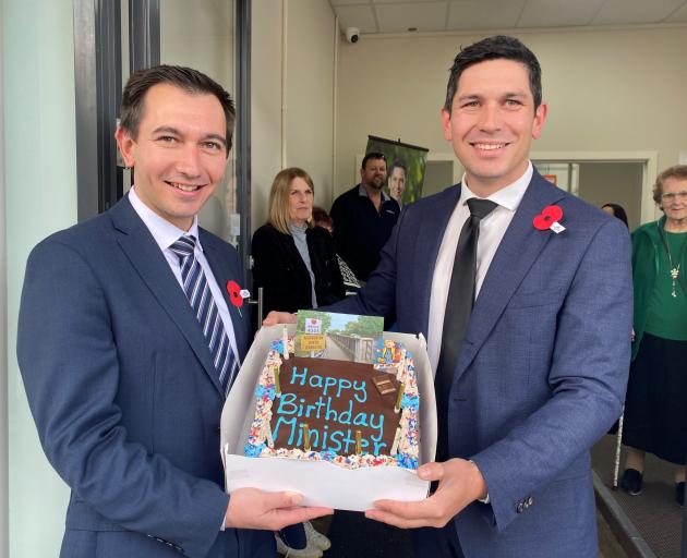 Transport Minister Simeon Brown received a belated birthday cake adorned with a photo of the...