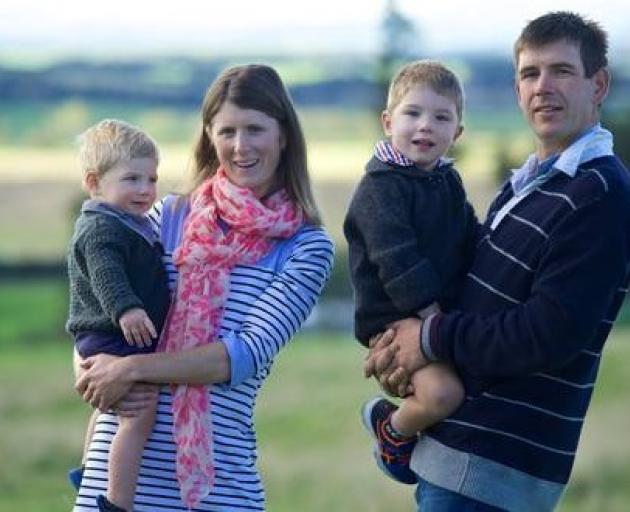 Nadine Tomlinson with husband Scott and sons Angus (right) and Sam. Photo: supplied via NZ Herald