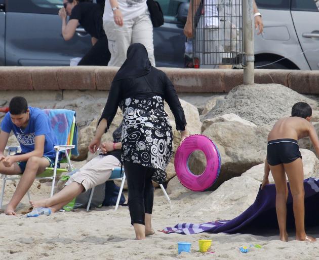 A woman wearing a burkini on a beach in Marseille earlier this month. Photo: Reuters 
