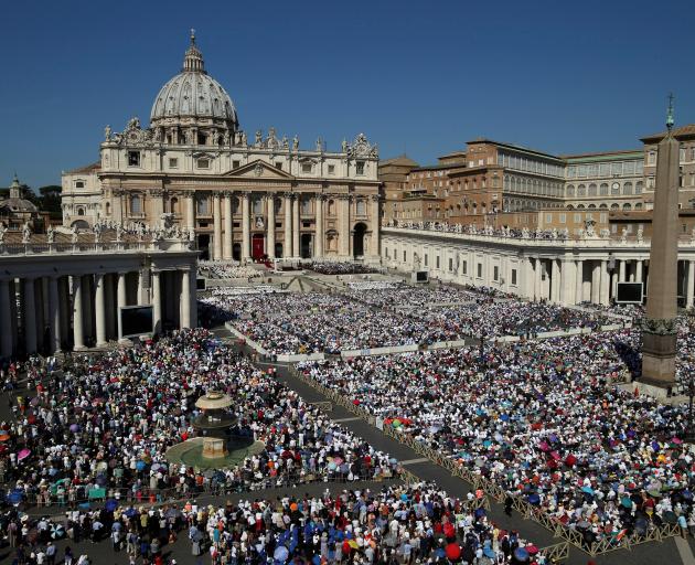 Hundreds of thousands of people packed St Peter's Square in the Vatican for the ceremony. Photo: Reuters