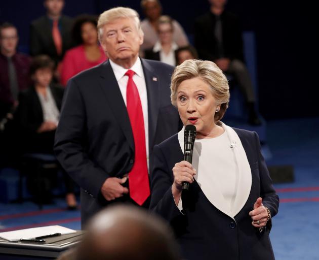 Hillary Clinton and Donald Trump during a debate held before the election. Photo: Reuters 