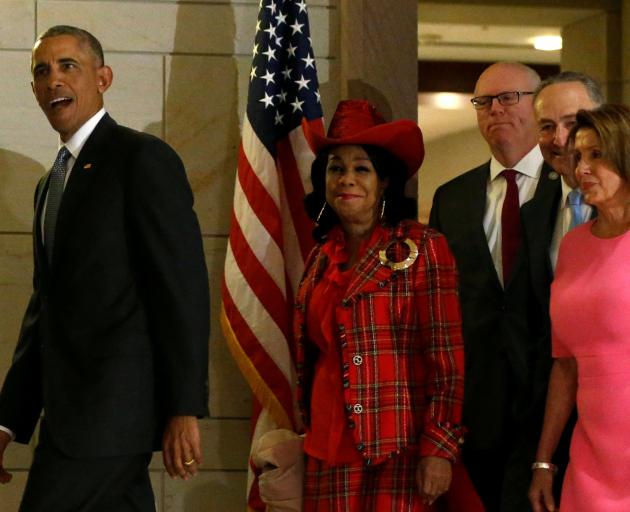 President Barack Obama (left) with congressional Democrats Frederica Wilson,  Joe Crowley, Chuck...