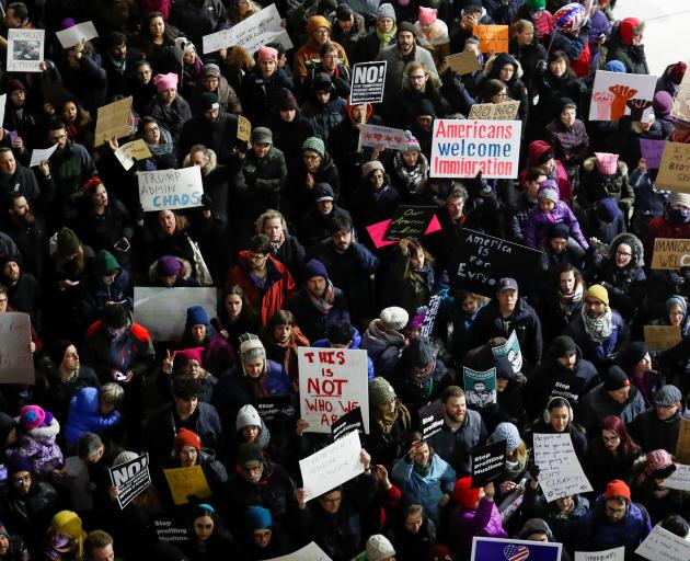 Protesters at O'Hare airport in Chicago on Saturday. Photo: Reuters  