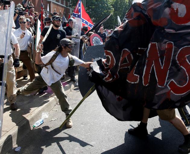 White supremacists clash with counter-protesters at a rally in Charlottesville. Photo: Reuters 