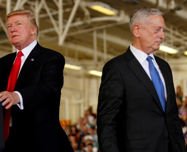 President Donald Trump (left) with Defence Secretary Jim Mattis. Photo: Reuters 