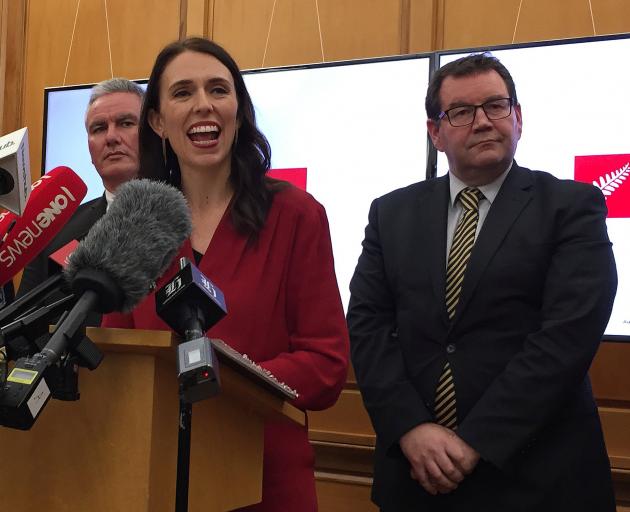 Labour leader Jacinda Ardern with MPs Kelvin Davis (left) and Grant Robertson. Photo: Reuters 



