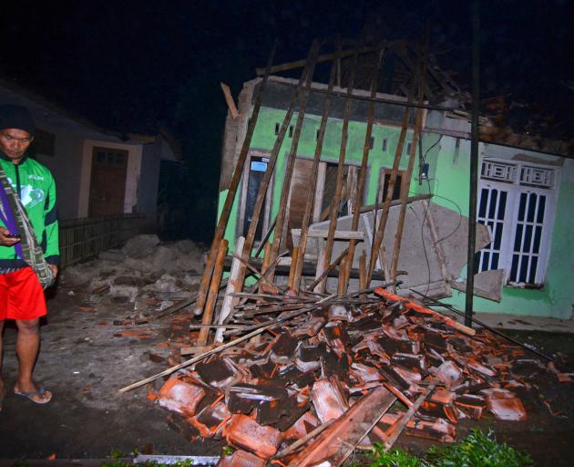 Houses were damaged in the village of Sumelap in Tasikmalaya. Photo: Antara Foto via Reuters 