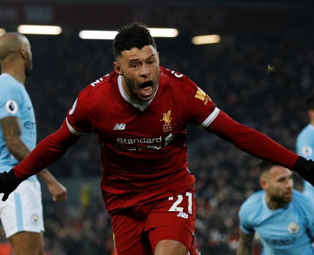 Alex Oxlade-Chamberlain celebrates scoring Liverpool's first goal. Photo: Reuters 