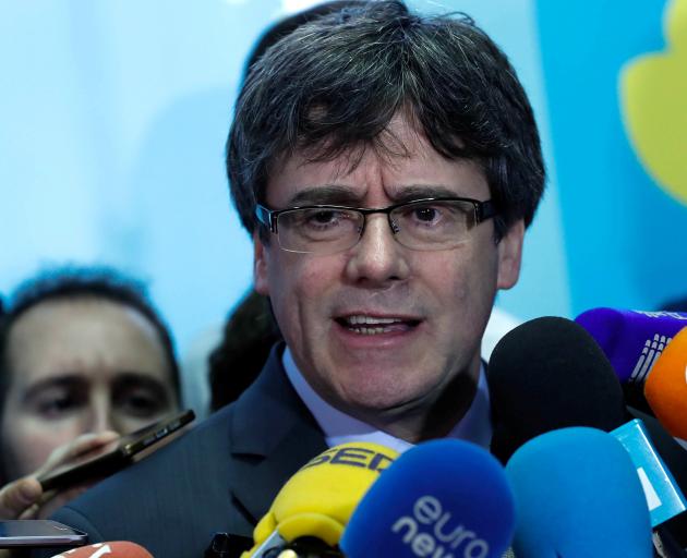 Carles Puigdemont is likely to be arrested and tried on charges including sedition and rebellion if he returns to Spain. Photo: Reuters