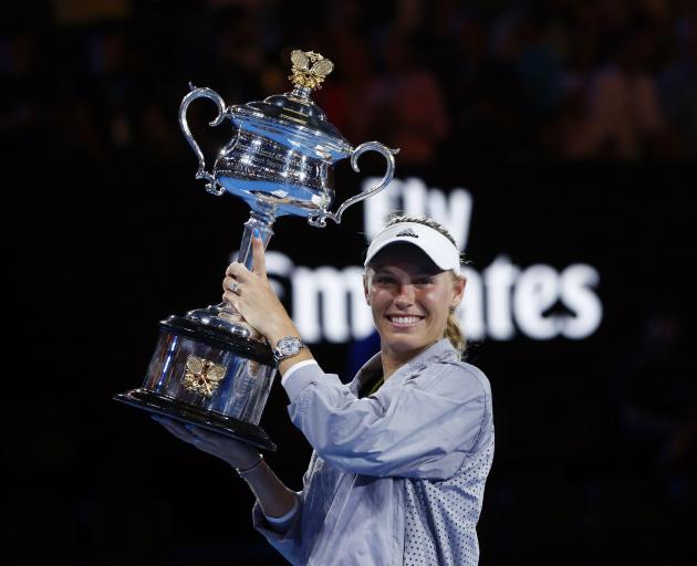 Denmark's Caroline Wozniacki celebrates winning the Australian Open last night. Photo: Reuters 