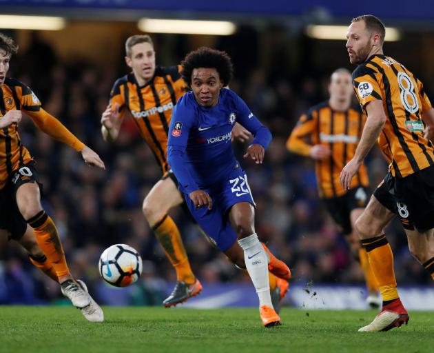 Willian (centre) scored his first goal for Chelsea. Photo: Reuters 