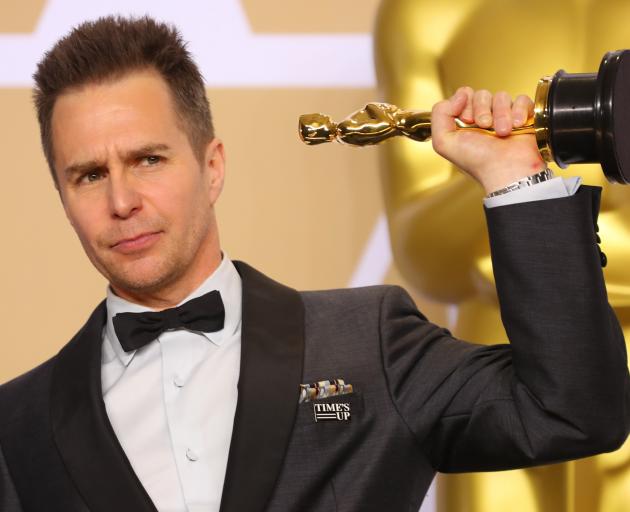 Sam Rockwell with the Oscar for Best Supporting Actor. Photo: Reuters 