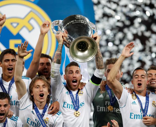 Real Madrid's Sergio Ramos lifts the trophy. Photo: Reuters 