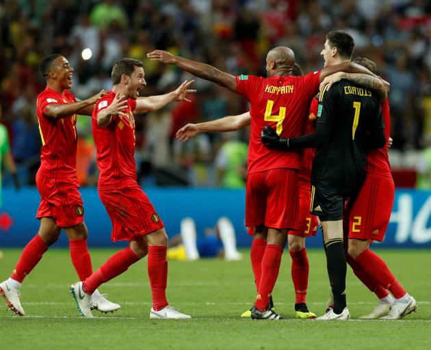 Belgium players celebrate beating Brazil. Photo: Reuters 
