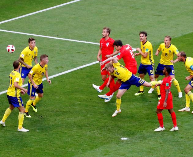 Harry Maguire scores Englands first goal against Sweden at the match in Samara.  Photo: Reuters 