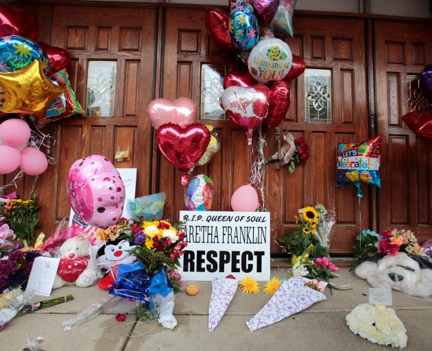 Flowers and other items have been placed outside the New Bethel Baptist Church in Detroit. Photo:...