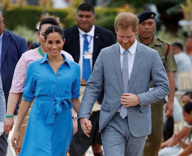 Meghan later changed into a Veronica Beard dress. Photo: Reuters