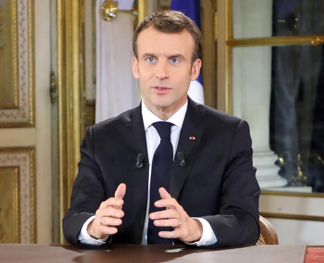Emmanuel Macron sought to restore calm and struck a humble tone in his televised address. Photo: Reuters 