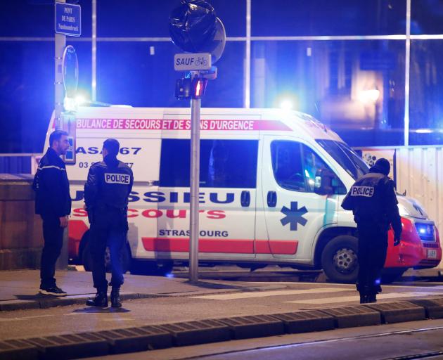 Police secure a street and the surrounding area. Photo: Reuters 