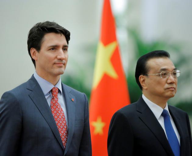 Canadian Prime Minister  Justin Trudeau with  Premier Li Keqiang iduring a trip to China in 2017....